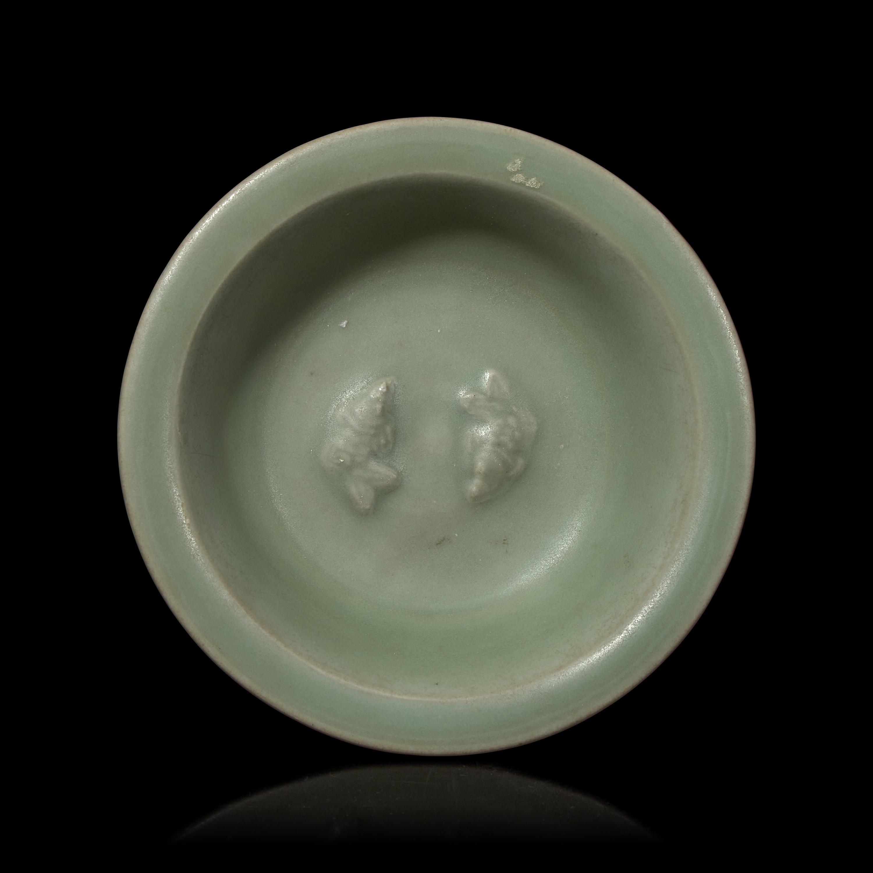 A Chinese Longquan Celadon Glazed 'Double Fish' Dish, Song-Yuan Dynasty 宋-元 龍泉窯雙魚碟