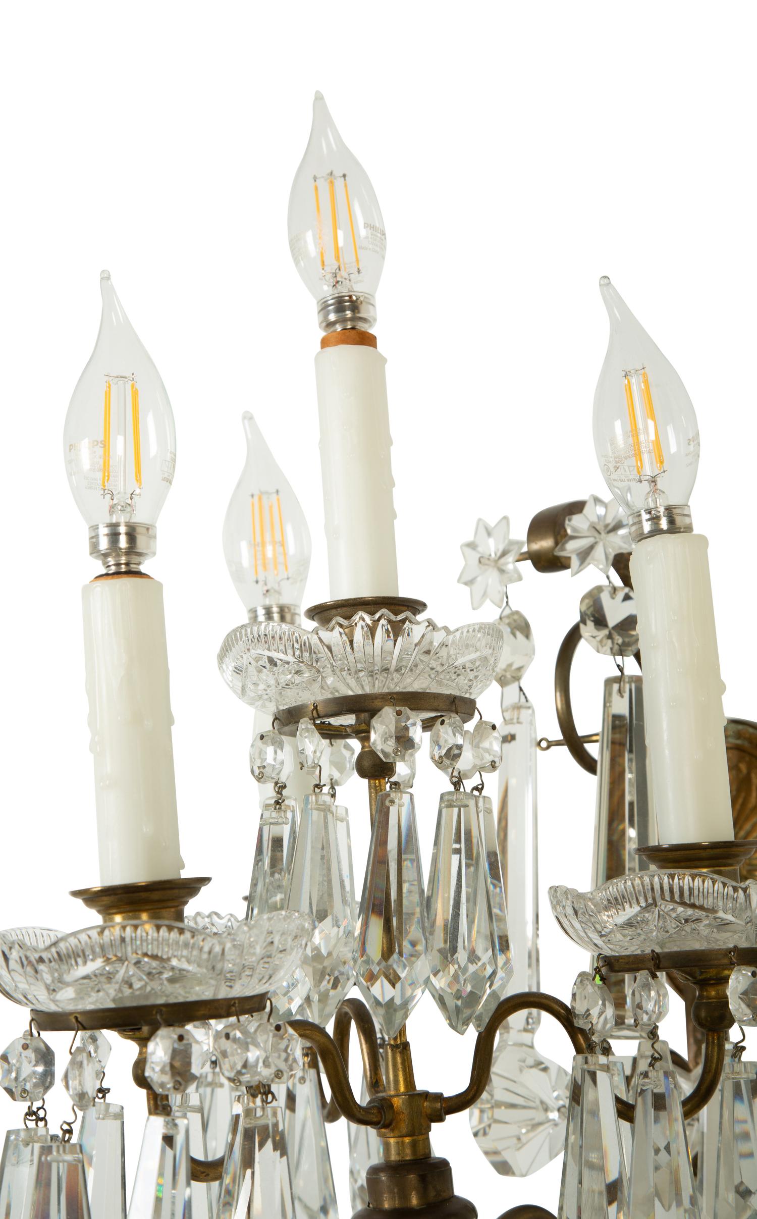 A Pair of Continental Gilt Metal and Cut Glass Four-Light Sconces