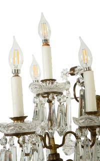 A Pair of Continental Gilt Metal and Cut Glass Four-Light Sconces