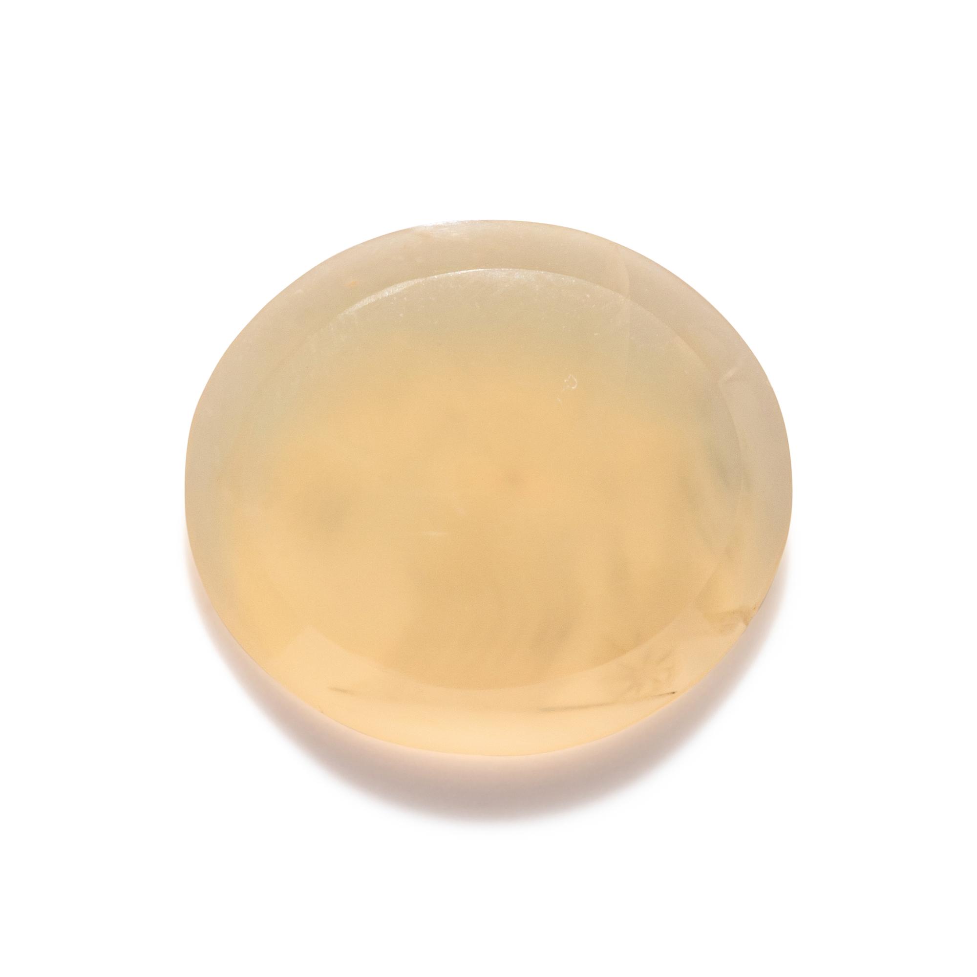 A Roman Chalcedony Ring Stone with a Charioteer Driving a Quadriga