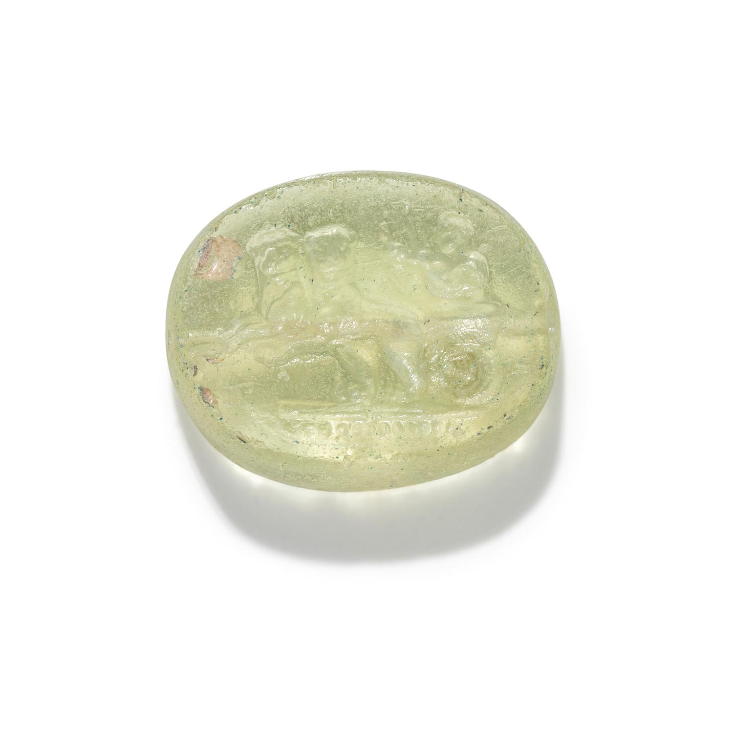 A Greek Glass Scaraboid with the God Dionysos Driving a Biga Chariot Pulled by Panthers