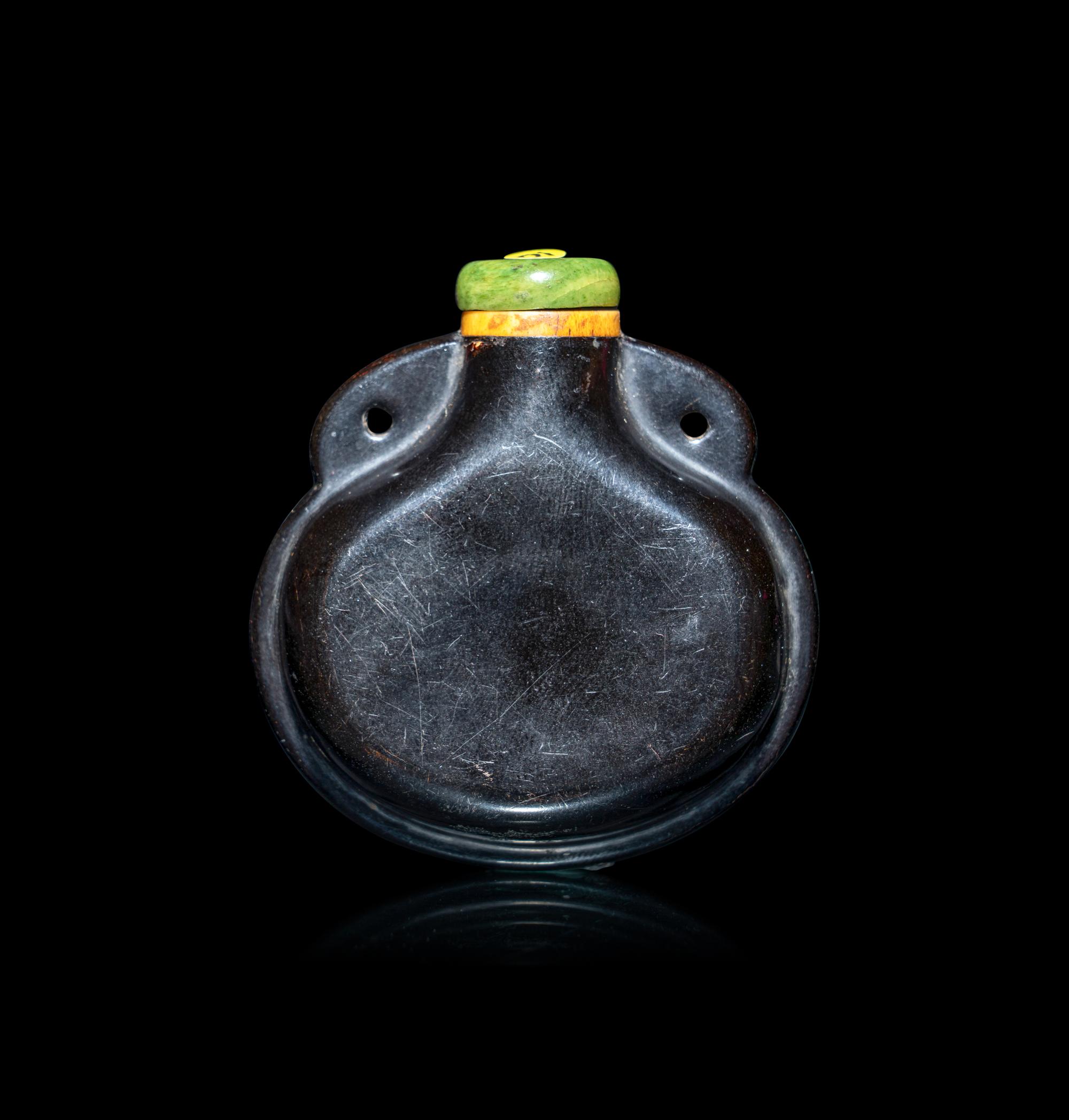A Chinese Black Lacquered Wood Snuff Bottle