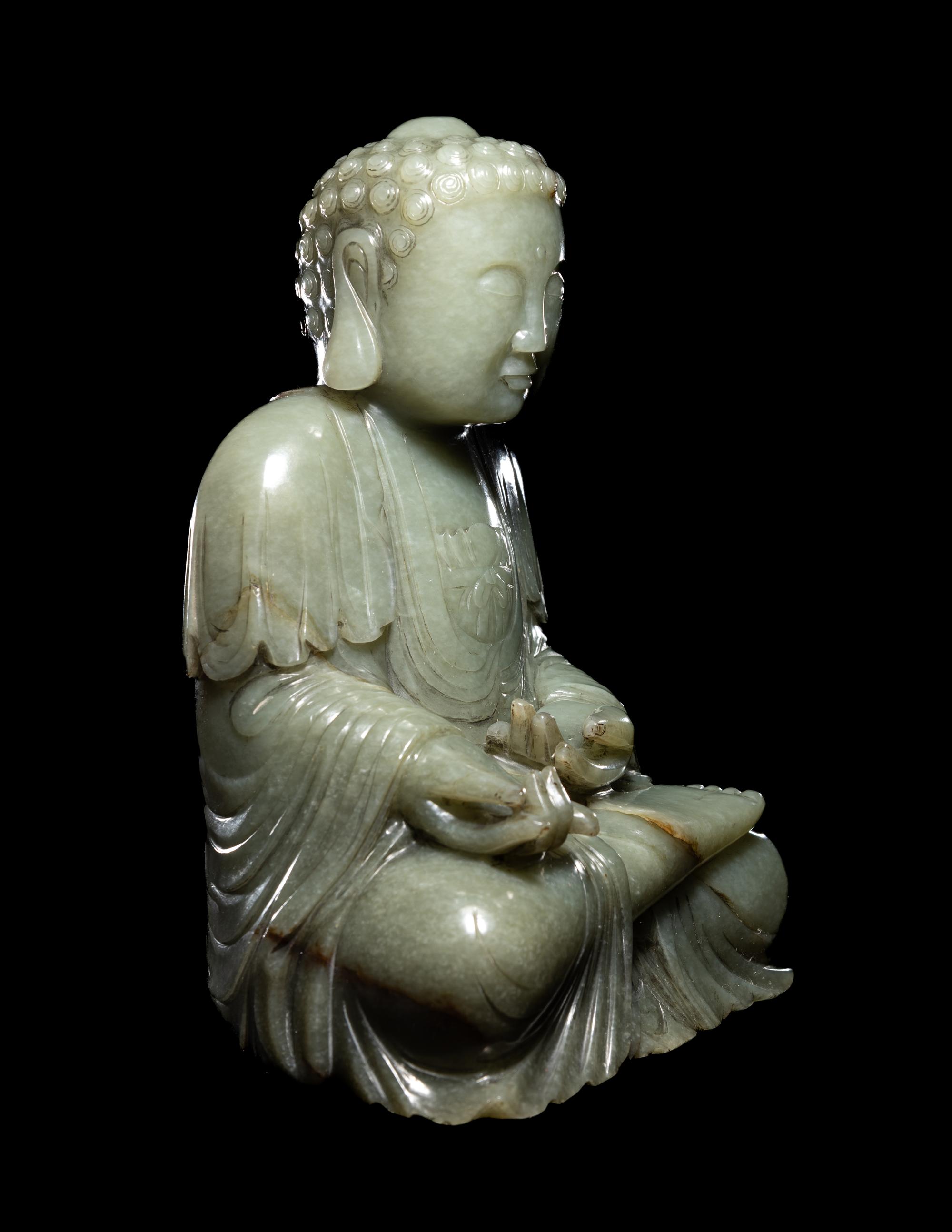 A Chinese Celadon Jade Figure of Medicine Buddha