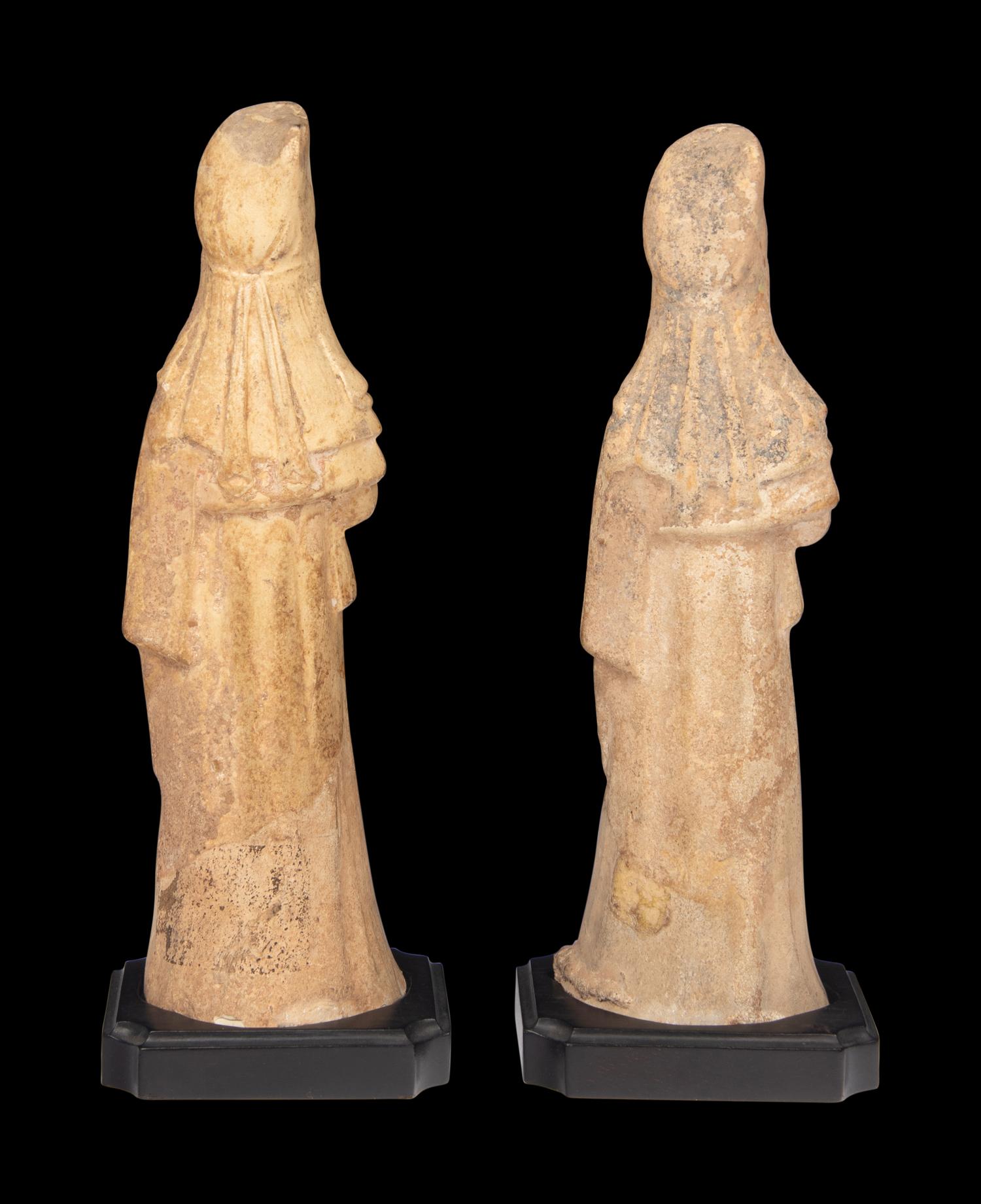 A Pair of Chinese Painted Pottery Figures of Ladies