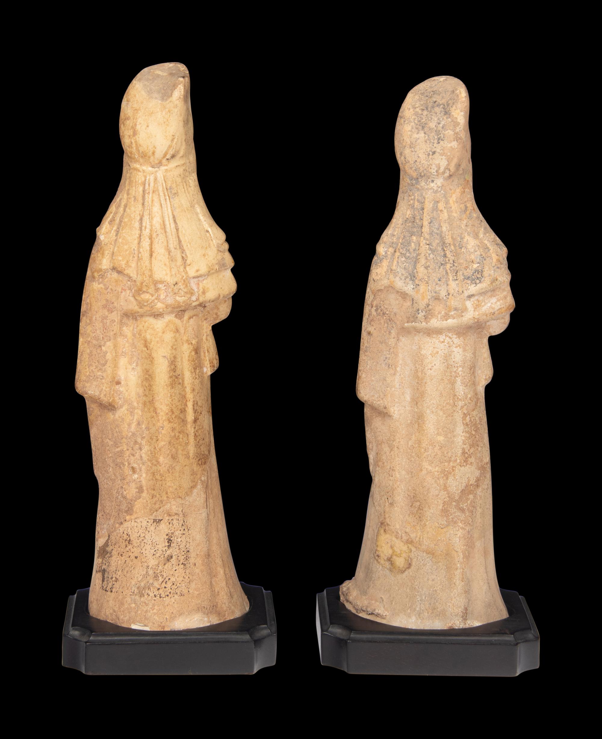 A Pair of Chinese Painted Pottery Figures of Ladies