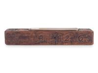 A Carved Wooden Folk Art Knife Sharpener