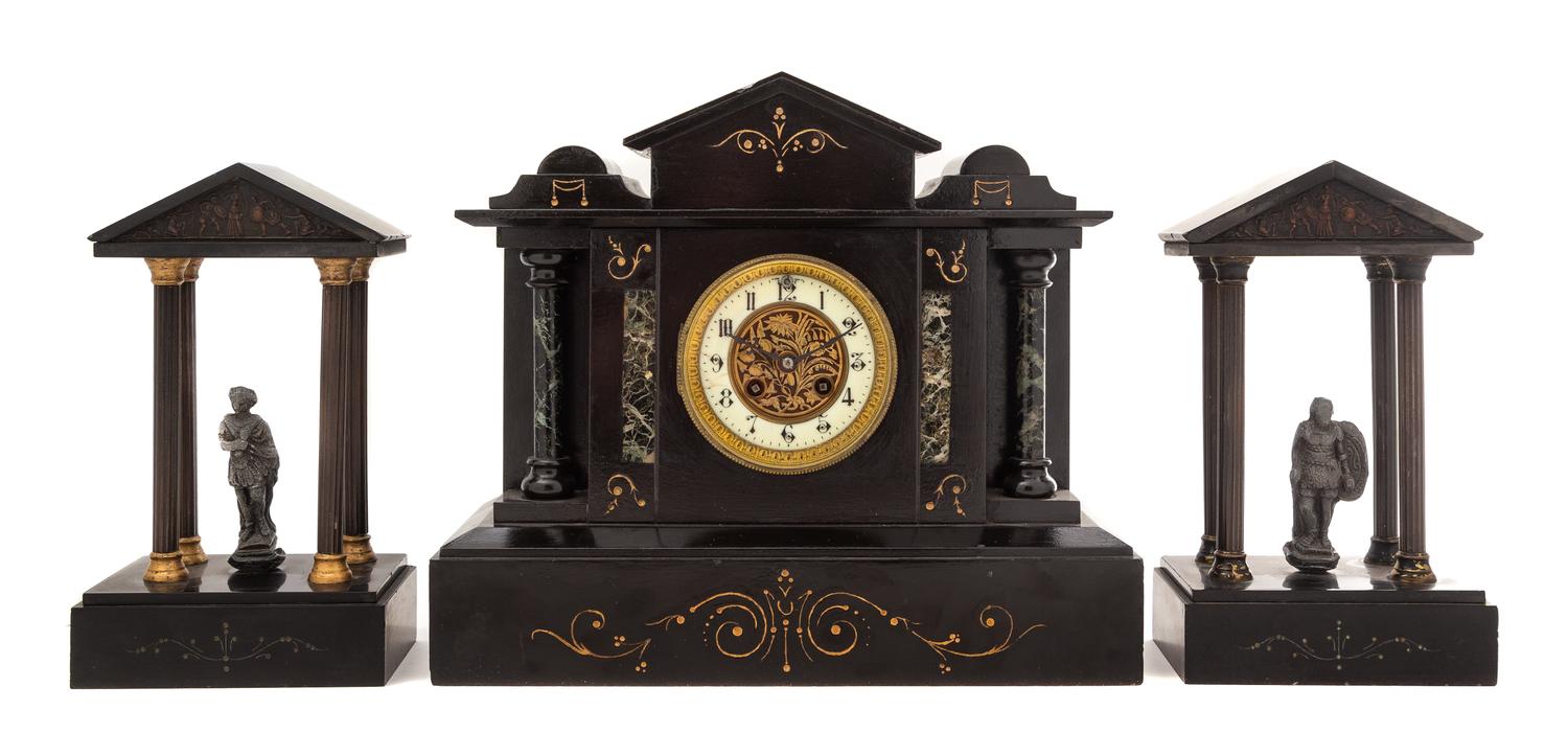A Continental Cast Metal and Slate Clock Garniture