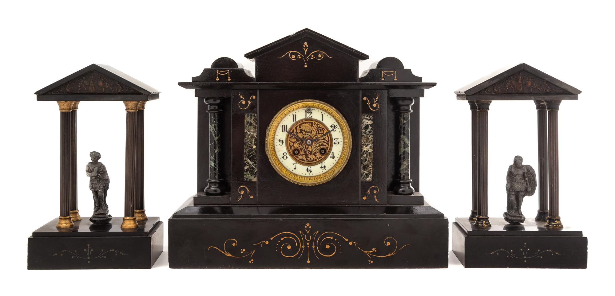 A Continental Cast Metal and Slate Clock Garniture