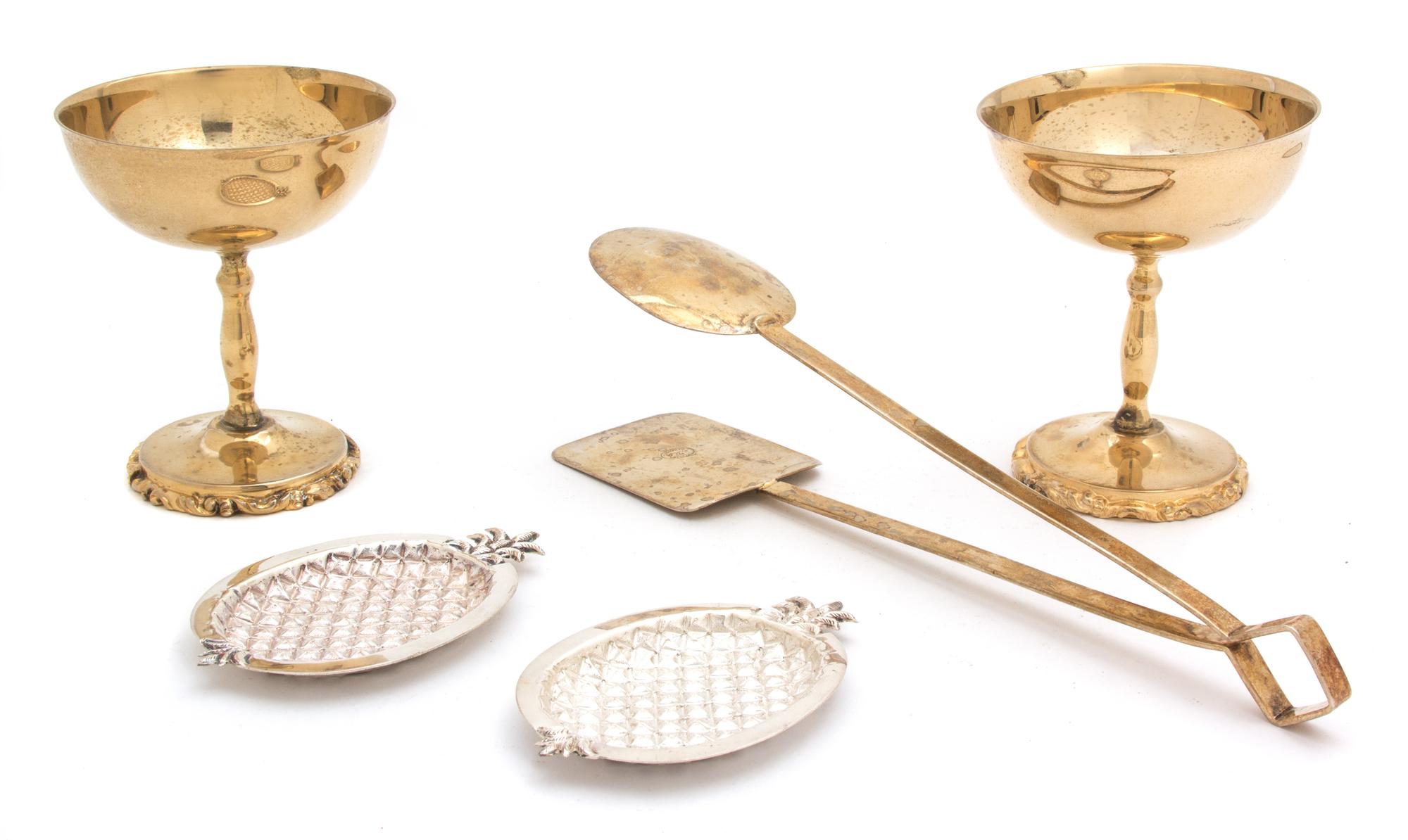 Five Mexican Silver Items, 20th Century, comprising a pair of gilt wash champagnes, a pair of gilt wash tongs and a pair of pineapple-f
