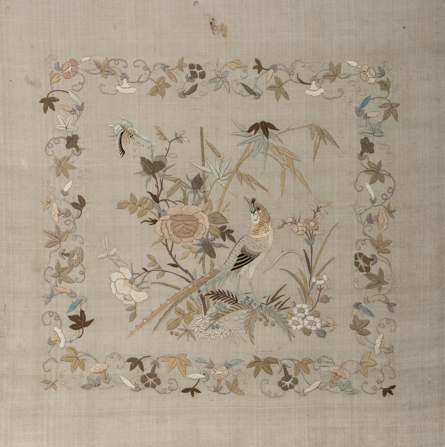 A Needlework Embroidered Picture of a Bird and Butterfly