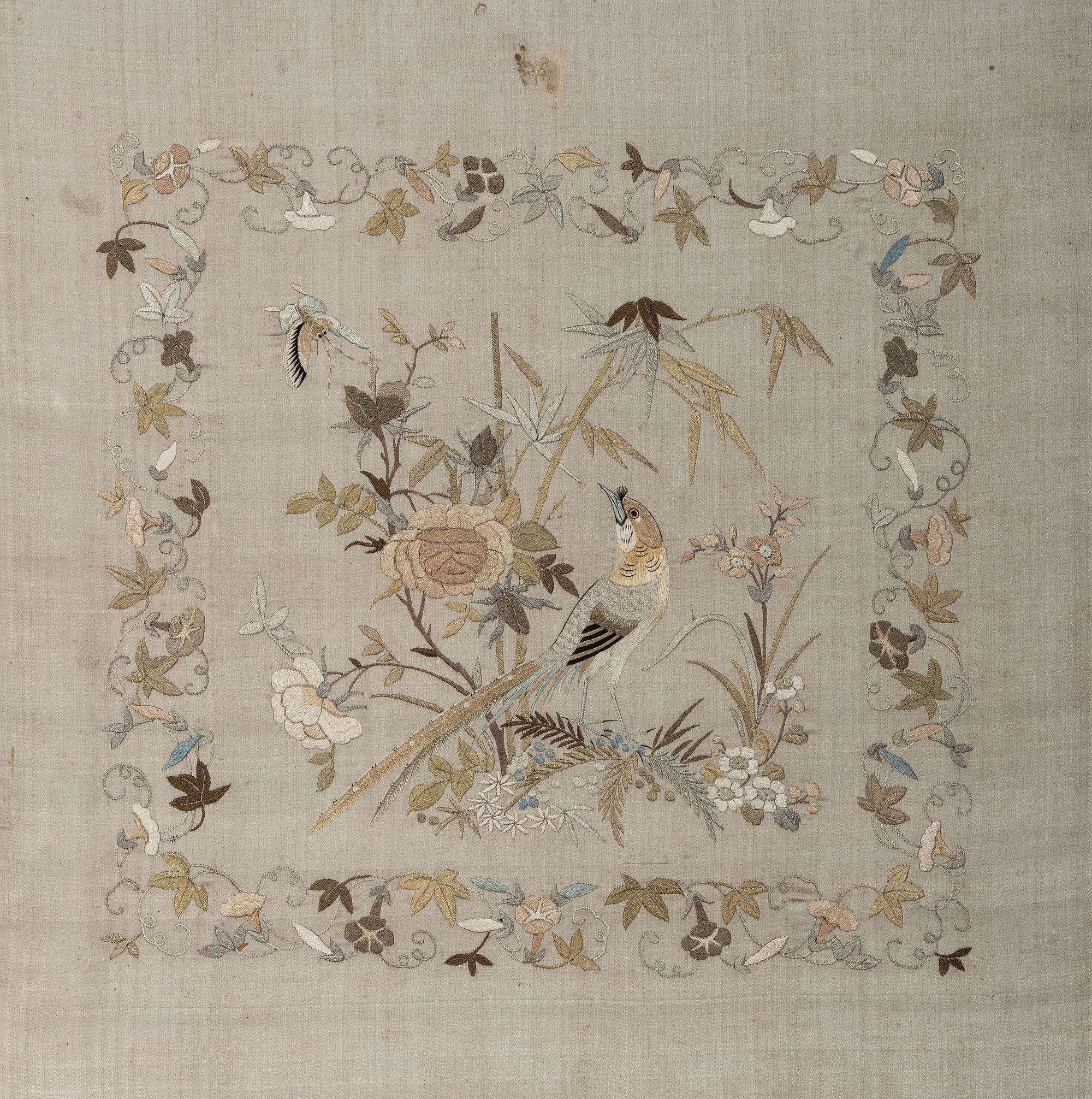 A Needlework Embroidered Picture of a Bird and Butterfly