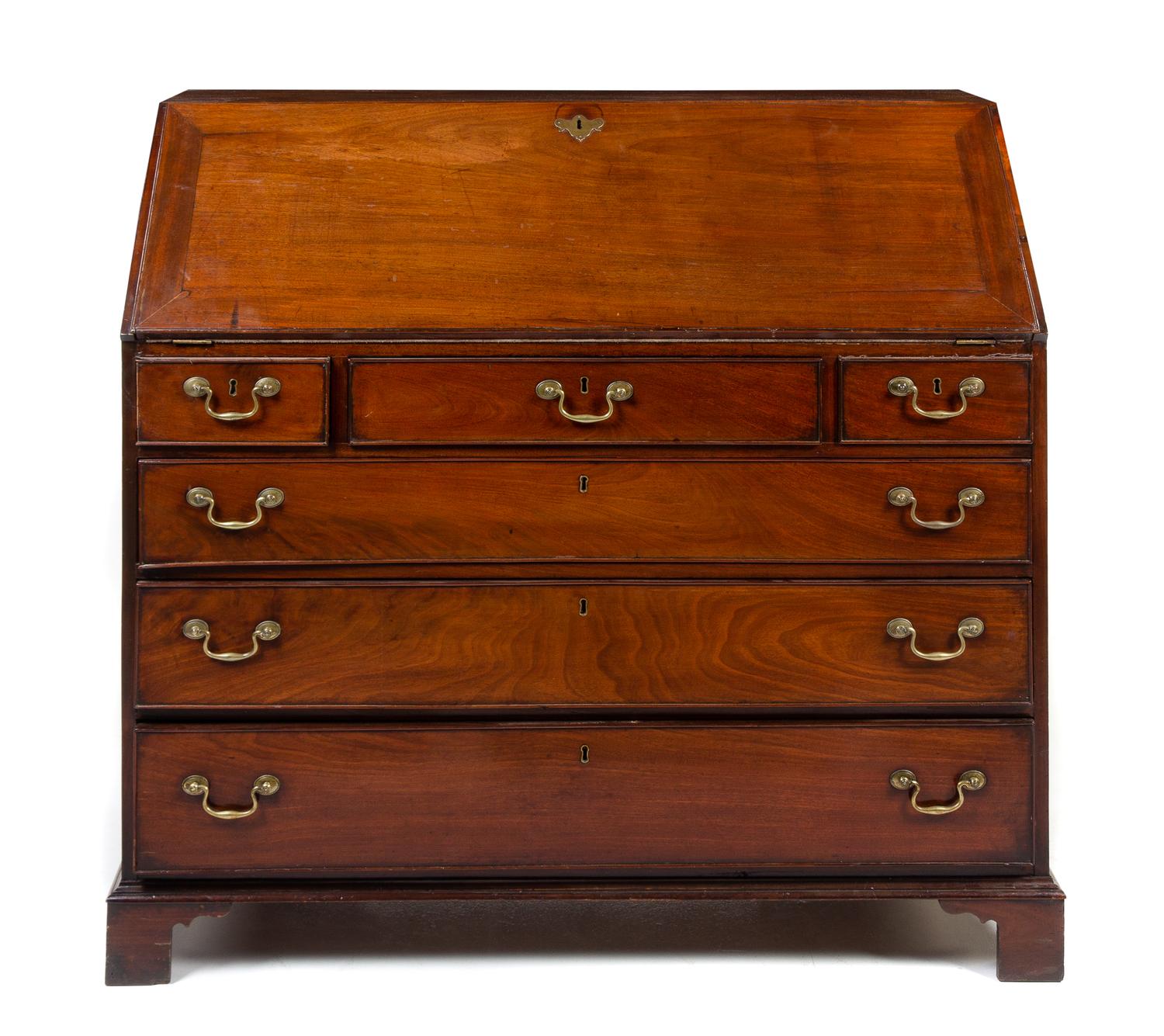 A George III Mahogany Slant-Front Secretary Height 44 3/4 x width 48 x depth 22 1/2 inches. — LATE 18TH CENTURY
