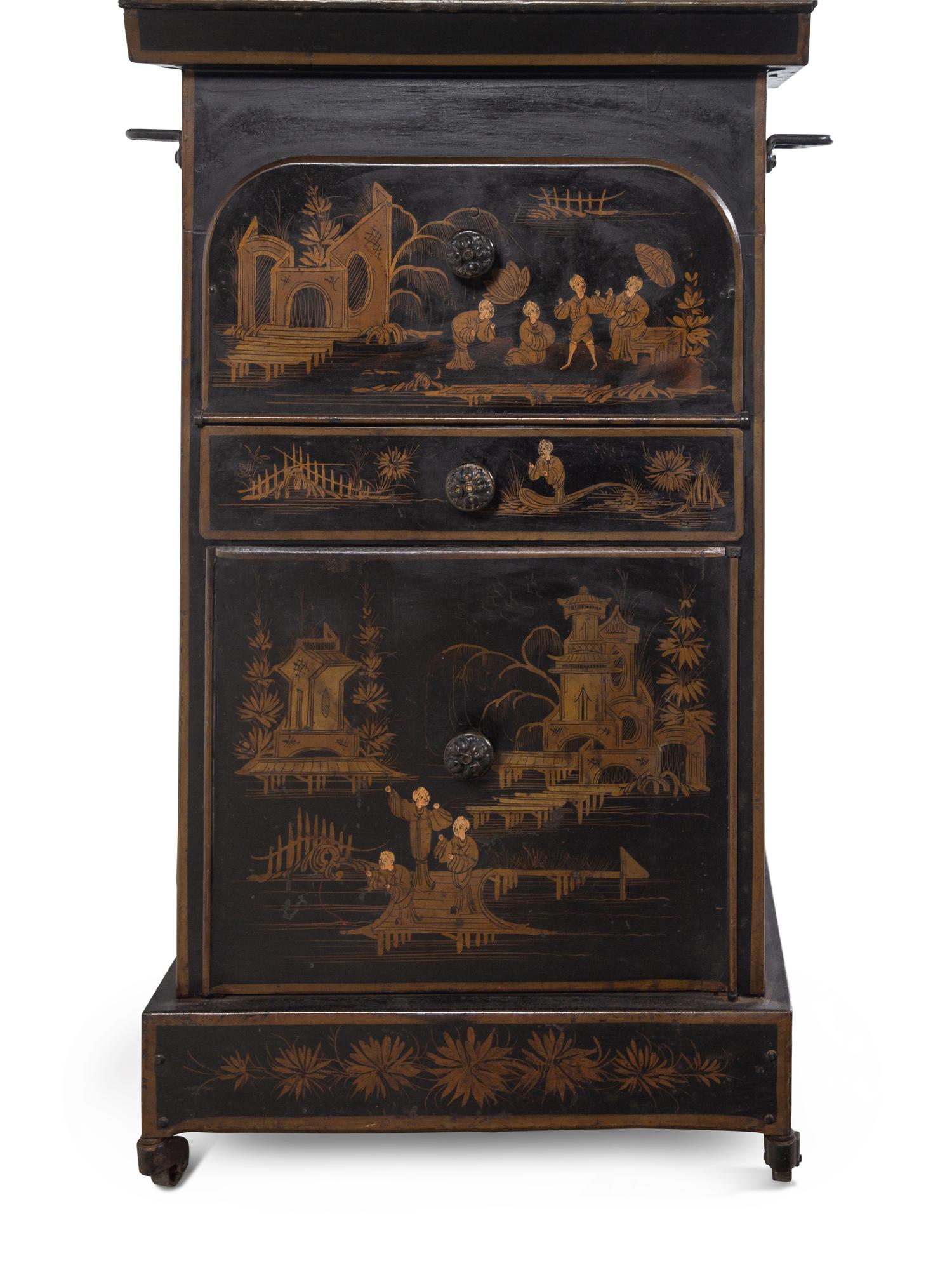 An English Chinoiserie Decorated Tôle Dressing Cabinet