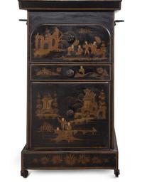 An English Chinoiserie Decorated Tôle Dressing Cabinet