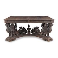 A Renaissance Revival Carved Oak Dining Table