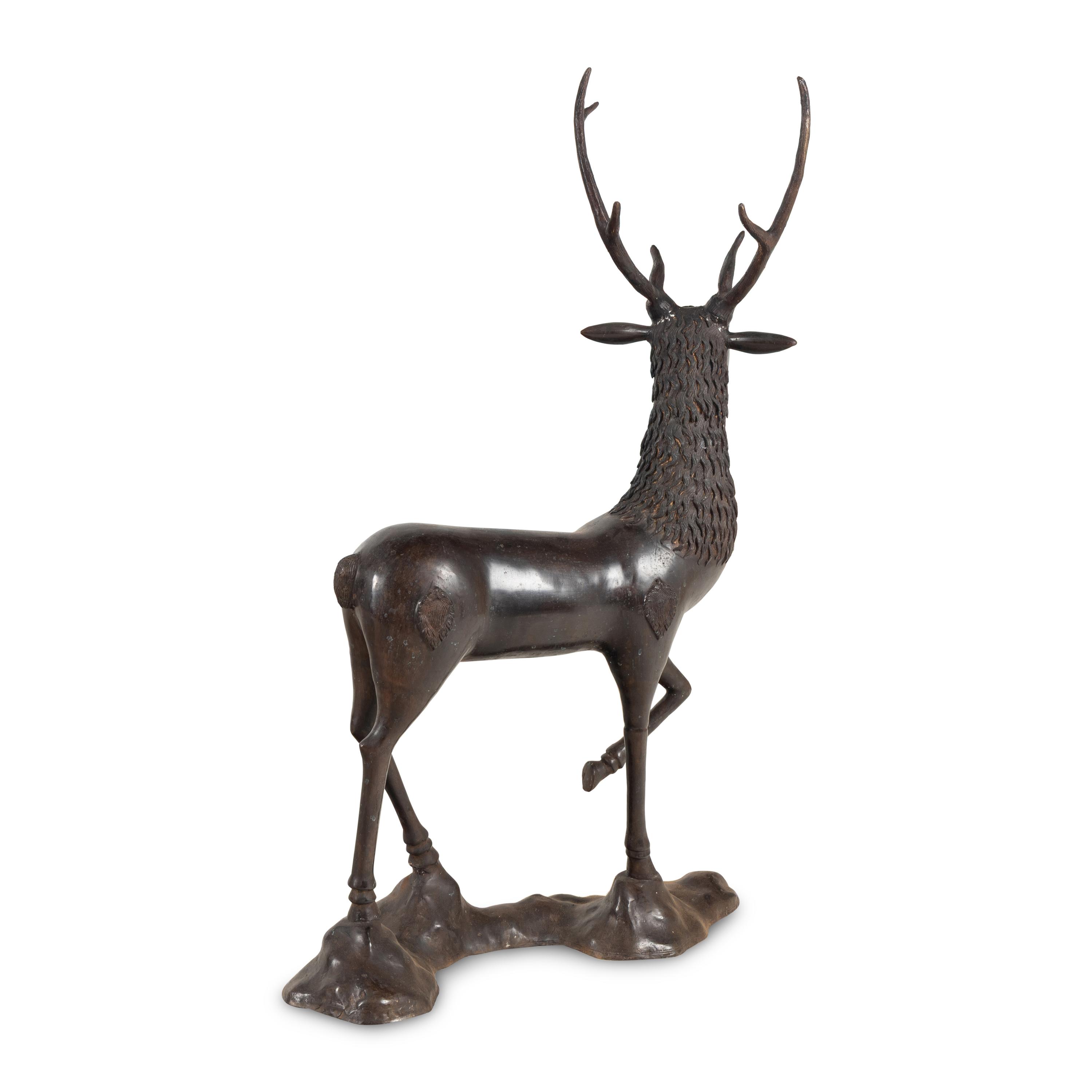 A Pair of Bronze Models of Stags