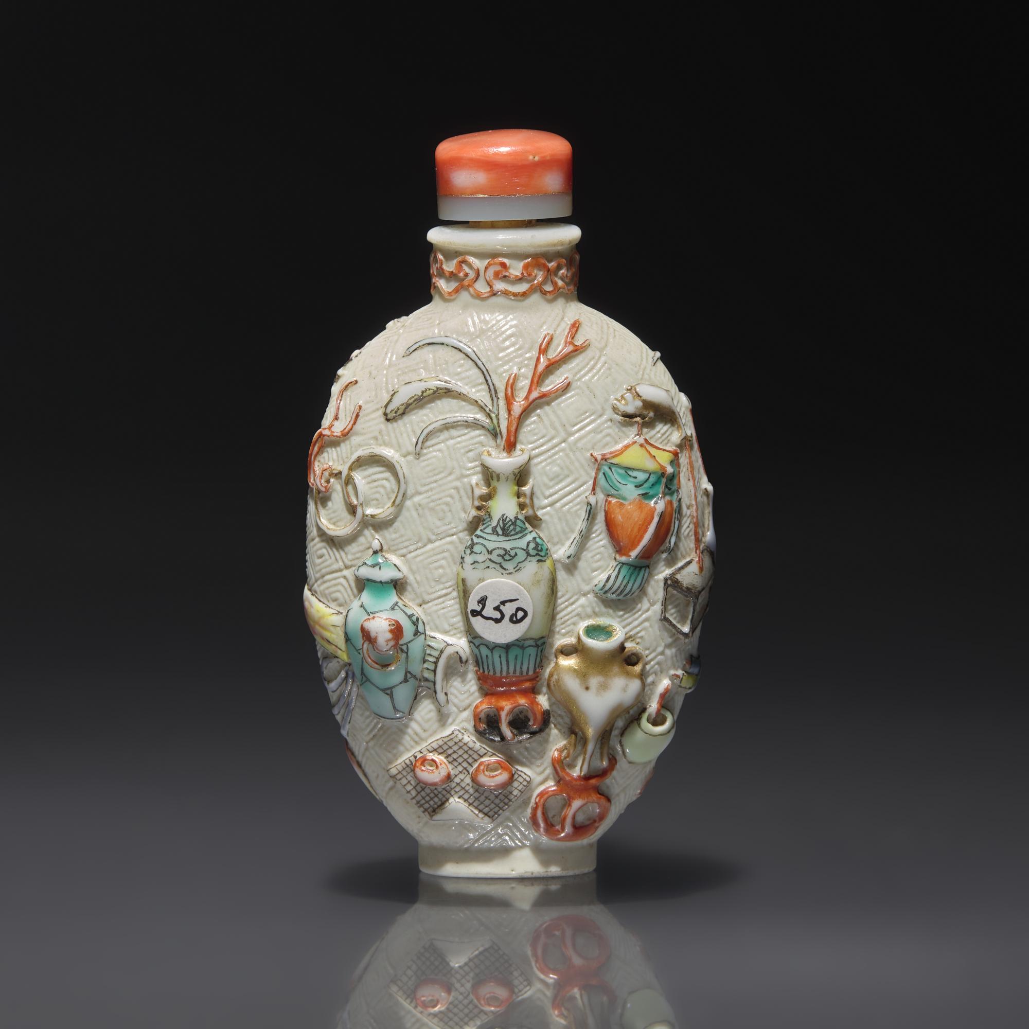 A Chinese Molded and Enameled "Bo Gu Tu" Porcelain Snuff Bottle, Qianlong Mark and of the Period — 1736-1795年 粉彩模印博古圖鼻煙壺