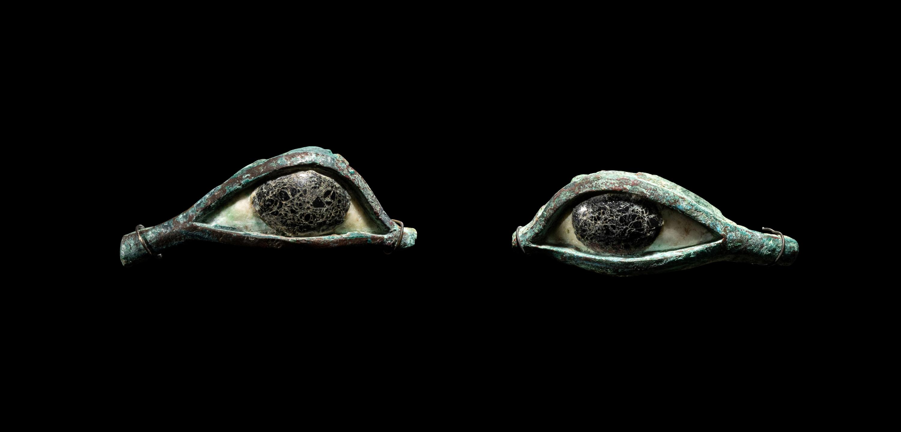 A Pair of Egyptian Bronze, Limestone, and Glass Eye Inlays