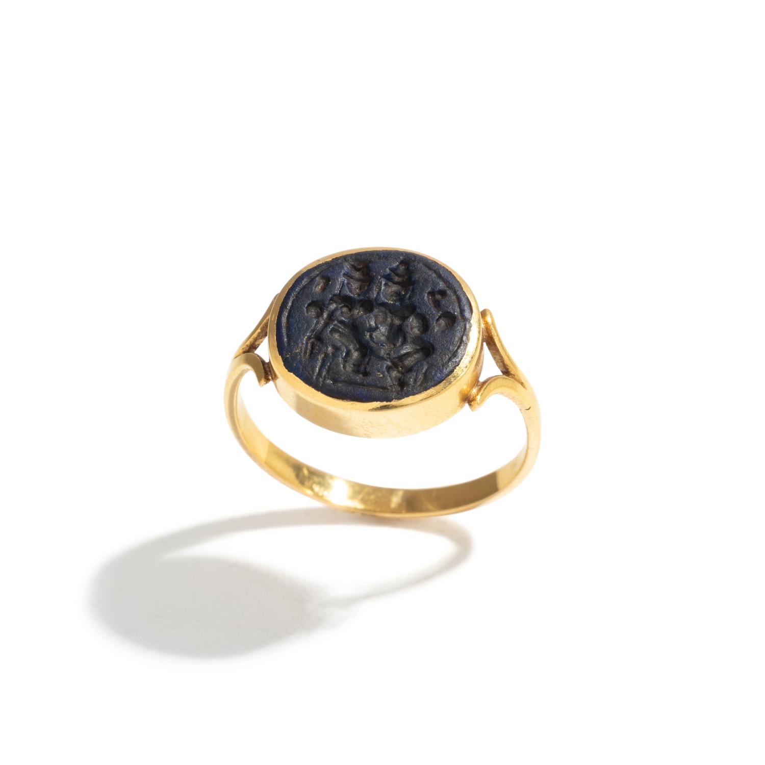 A Persian Blue Glass Intaglio with Two Figures — Set in a gold ring