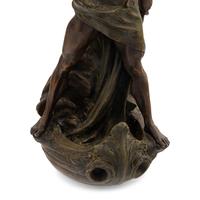 A Cast Metal Figural Newel Post Lamp