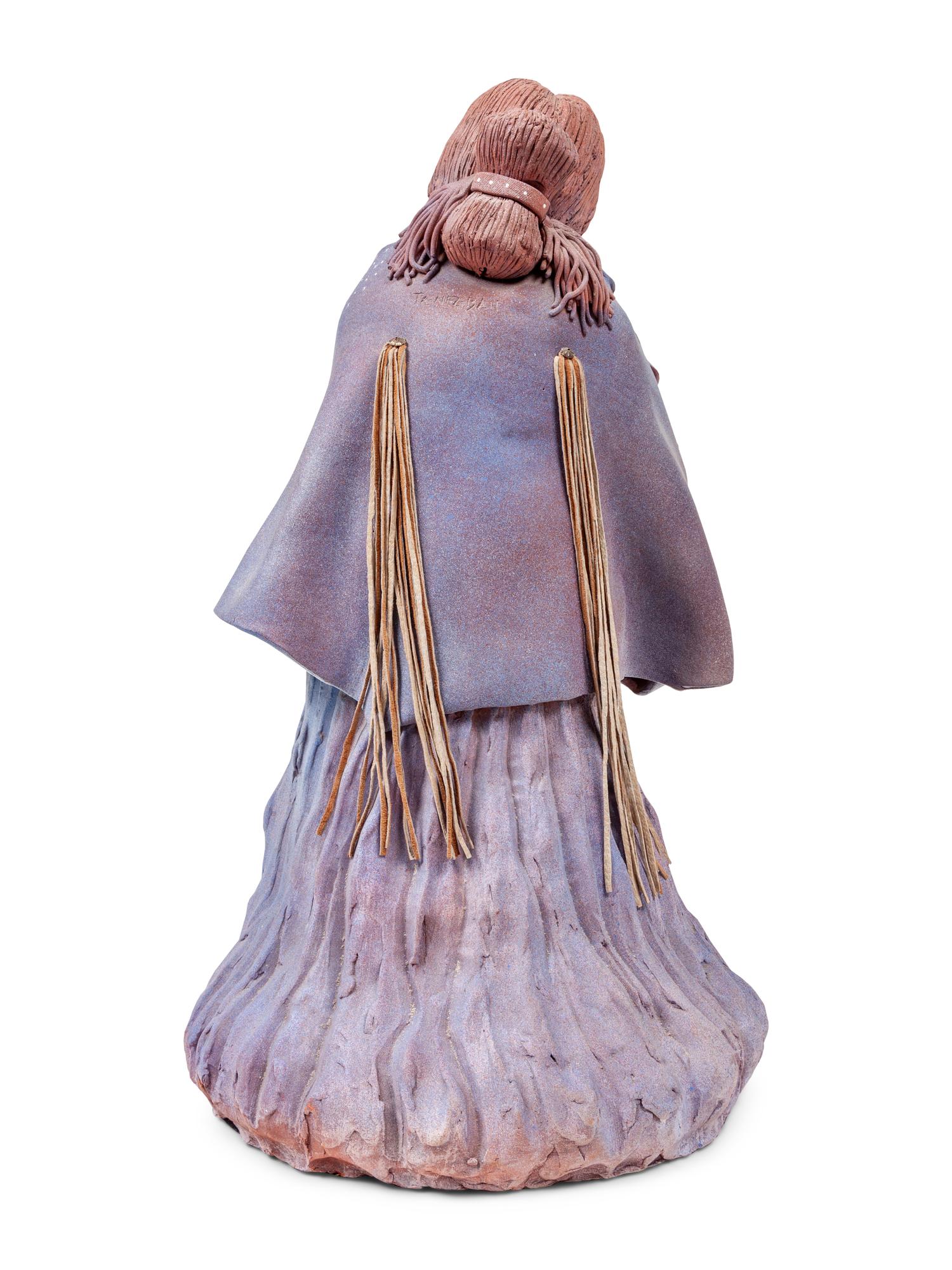 A Pair of Ceramic Figures
