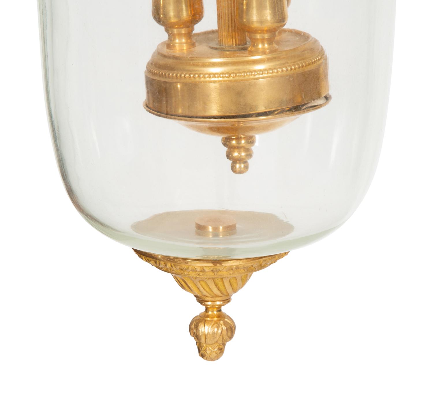A Pair of French Gilt Metal and Glass Lanterns