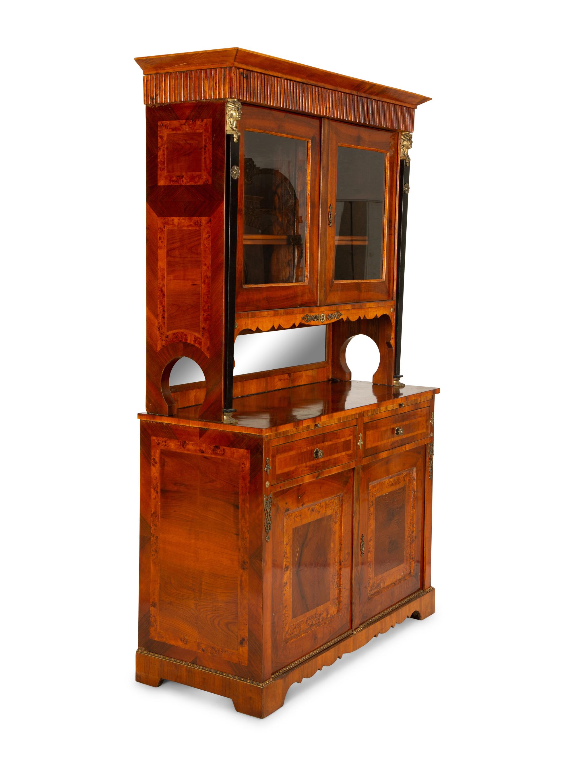 An Austrian Biedermeier Cross Banded and Ebonized Buffet