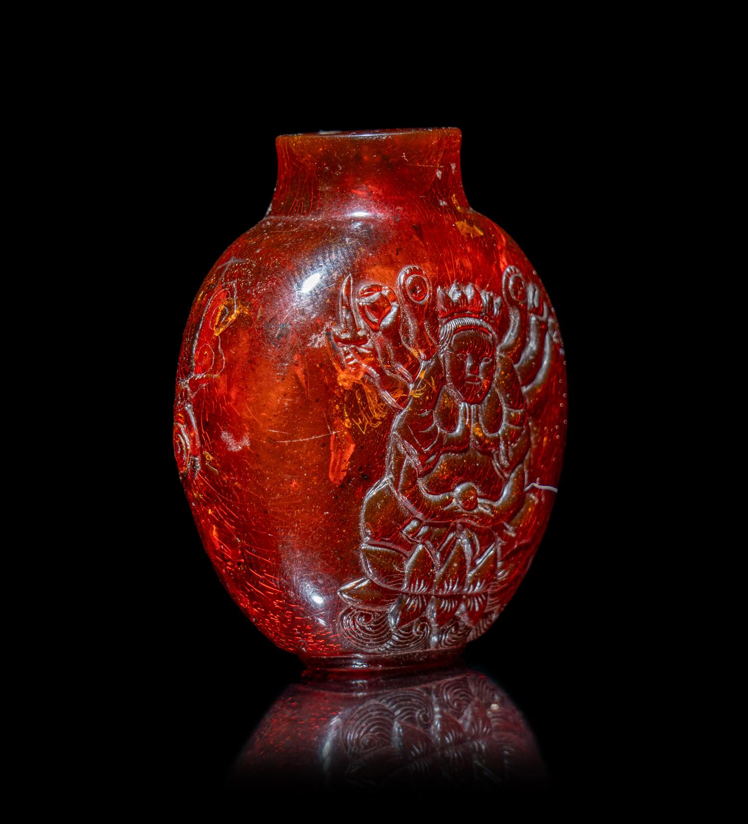 A Chinese Carved Amber Snuff Bottle