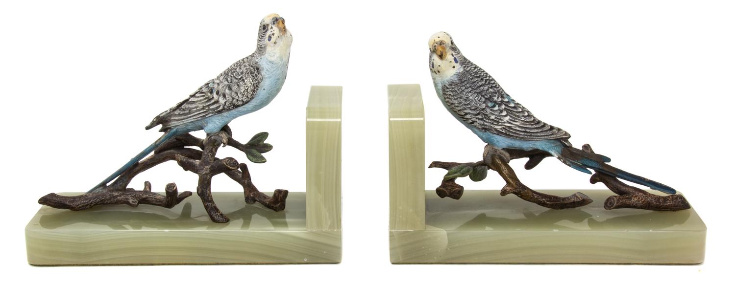 A Pair of Austrian Cold-Painted Bronze and Onyx Bookends Width 7 3/4 inches.