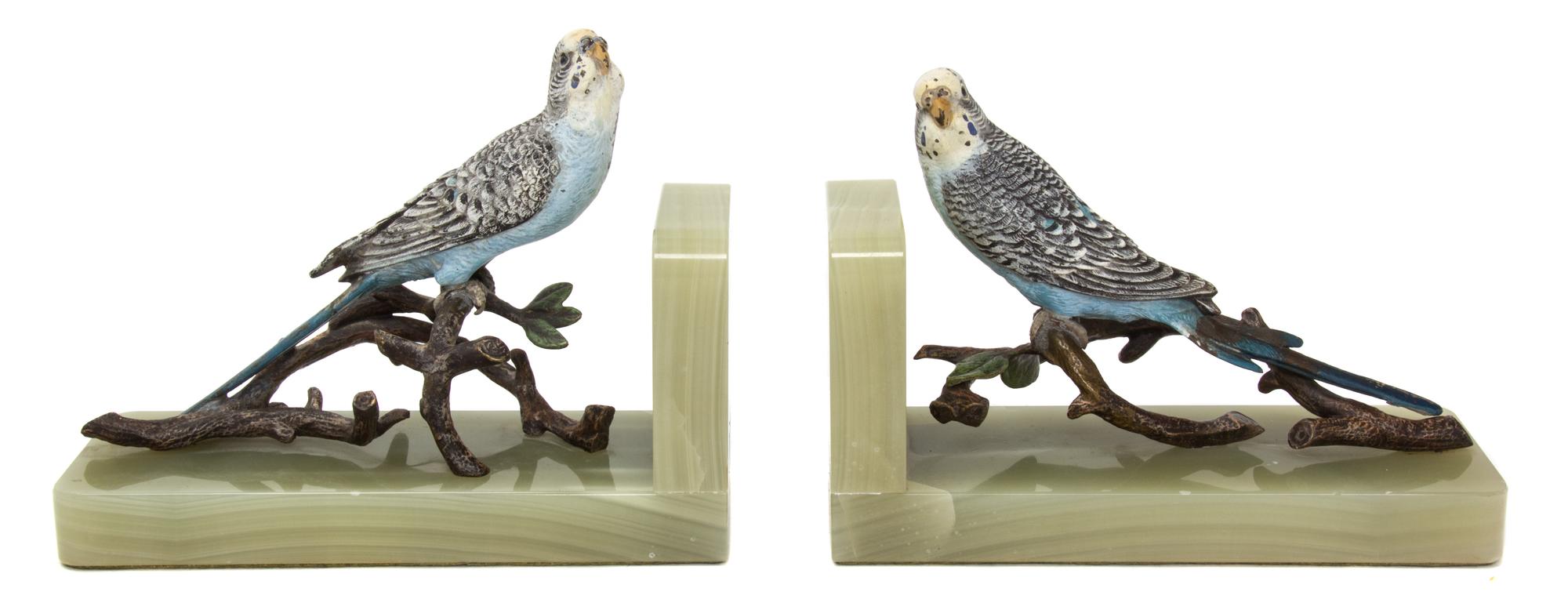 A Pair of Austrian Cold-Painted Bronze and Onyx Bookends Width 7 3/4 inches.
