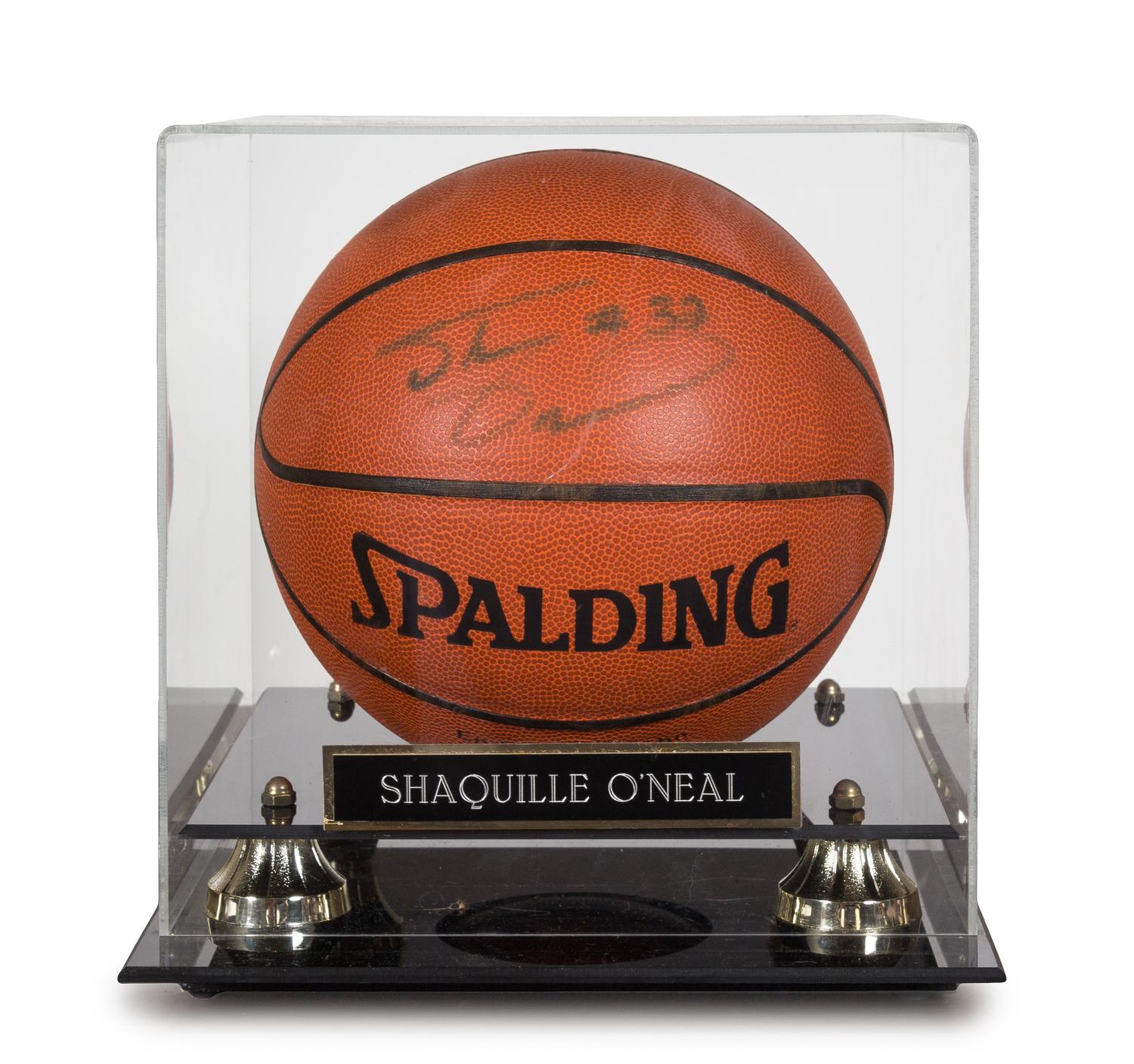 A Shaquille O'Neal Autographed Basketball height of display case 12 x width 11 x depth 12 inches.