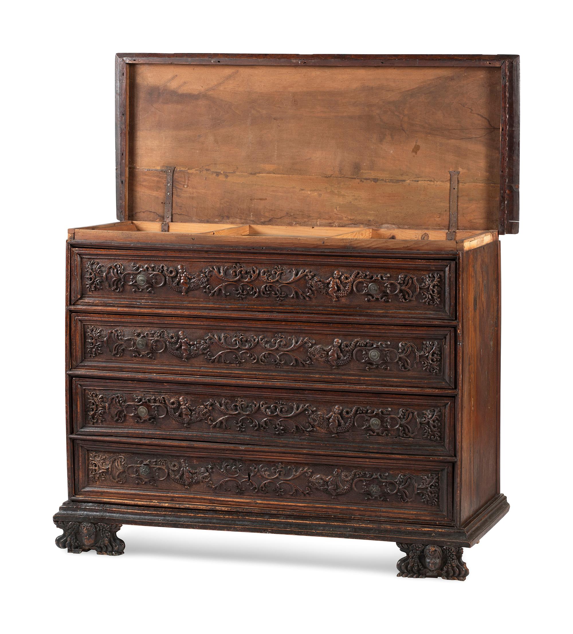 A Baroque Highly Carved Walnut Commode