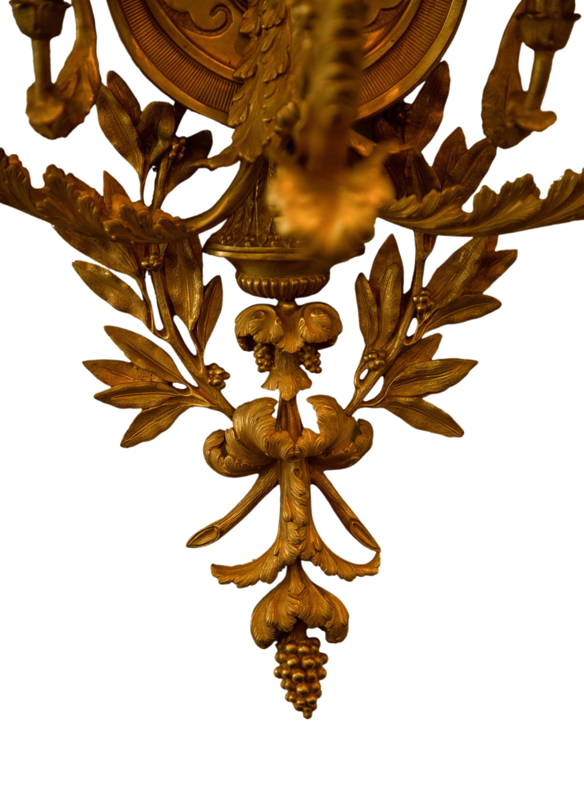 A Set of Four Louis XVI Style Gilt Bronze Five-Light Sconces
