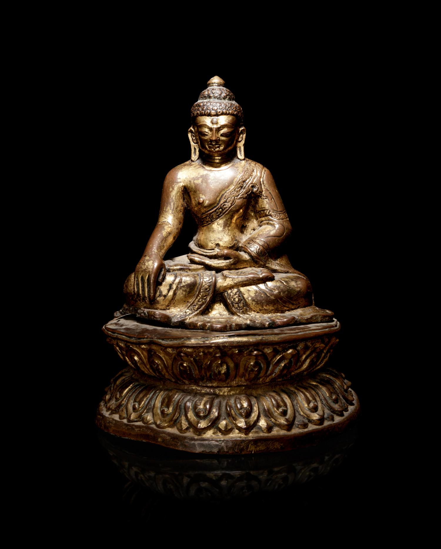 A Nepalese Gilt Bronze Figure of Buddha Shakyamuni