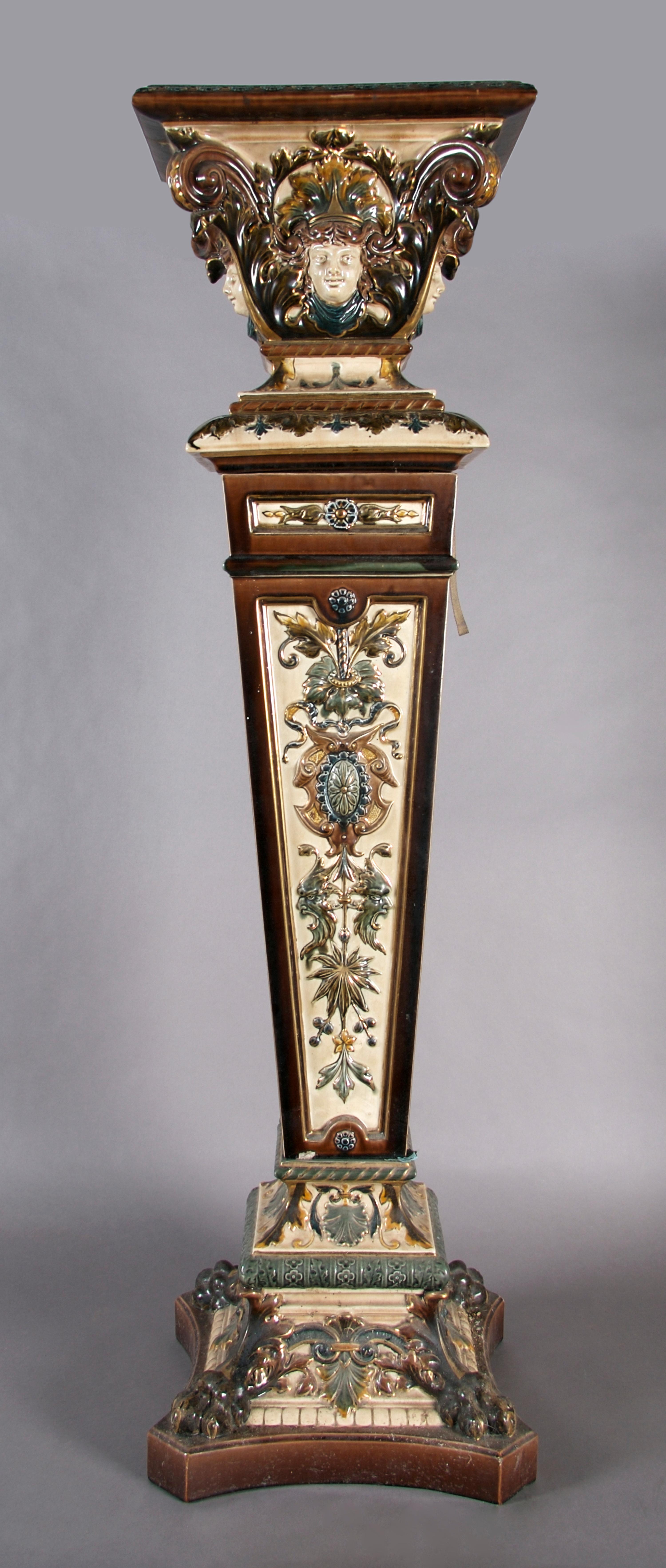 A Continental Majolica Pedestal, Height 45 x width 12 1/4 x depth 12 1/4 inches.