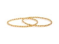 PAIR OF HIGH KARAT GOLD BANGLE BRACELETS