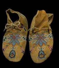 Pair of Crow beaded hide moccasins montana, first half 20th century