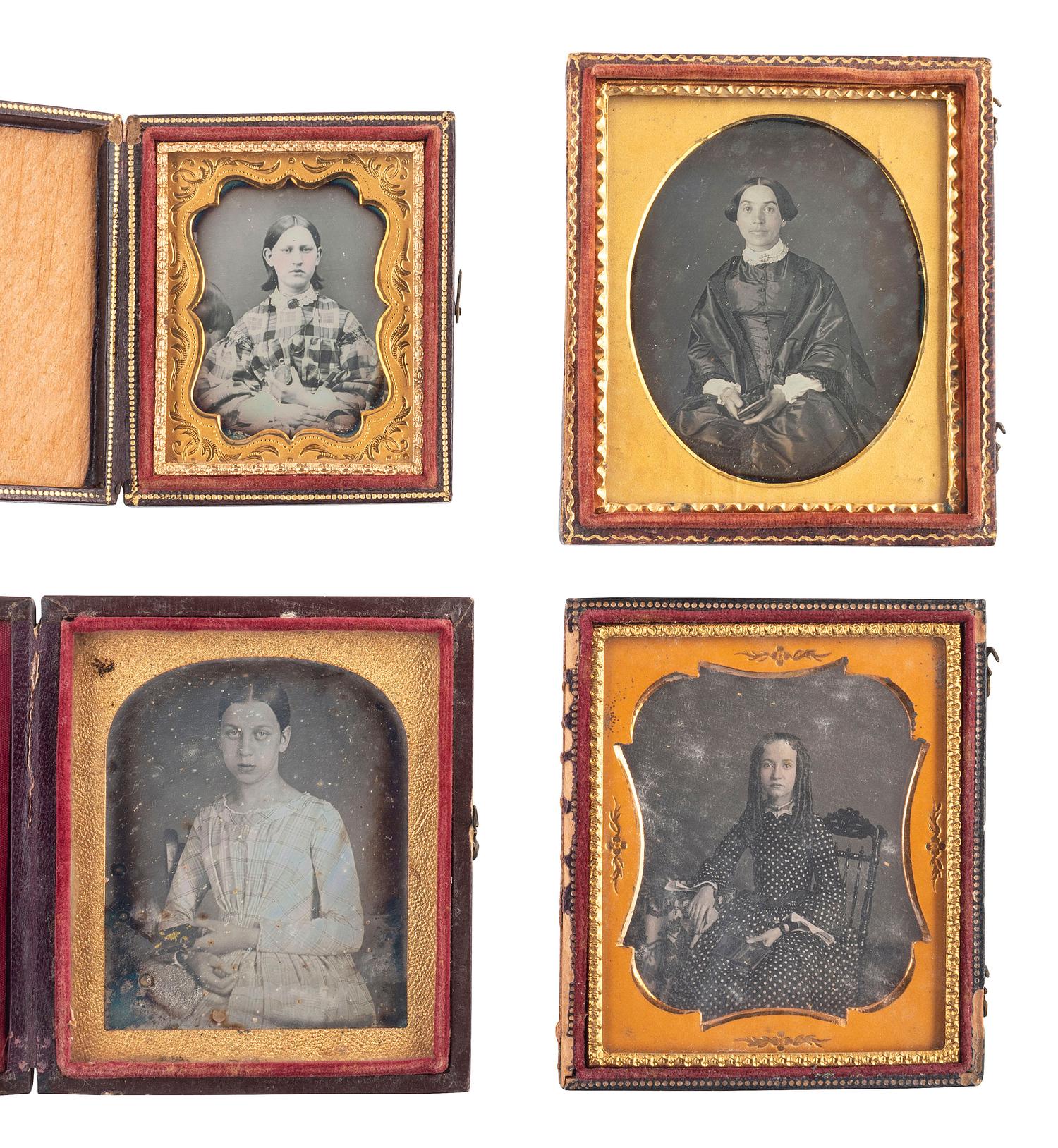 [EARLY PHOTOGRAPHY]. 12 daguerreotype portraits of female subjects holding cased images, including: