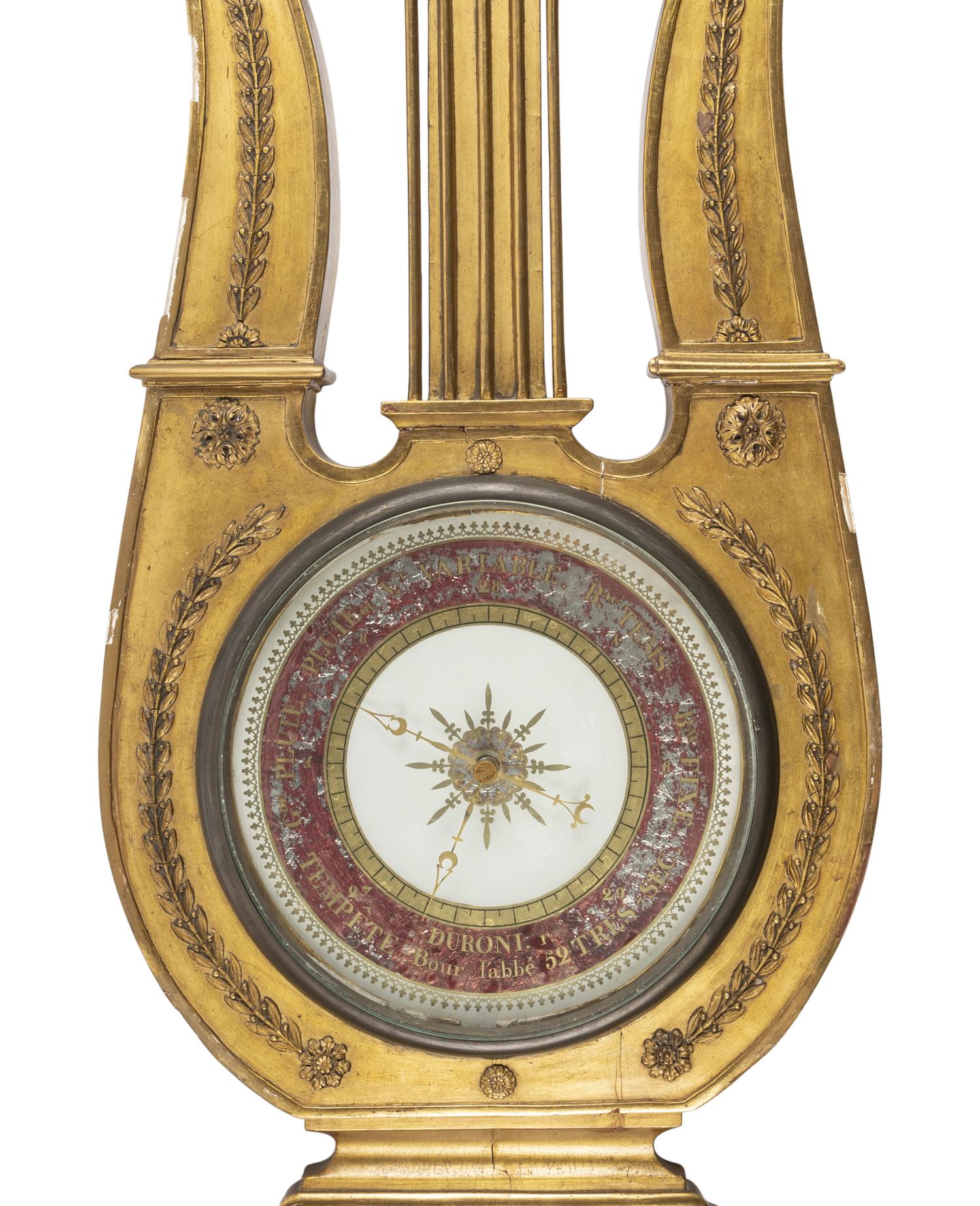 An Empire Giltwood and Reverse-Painted Glass Barometer