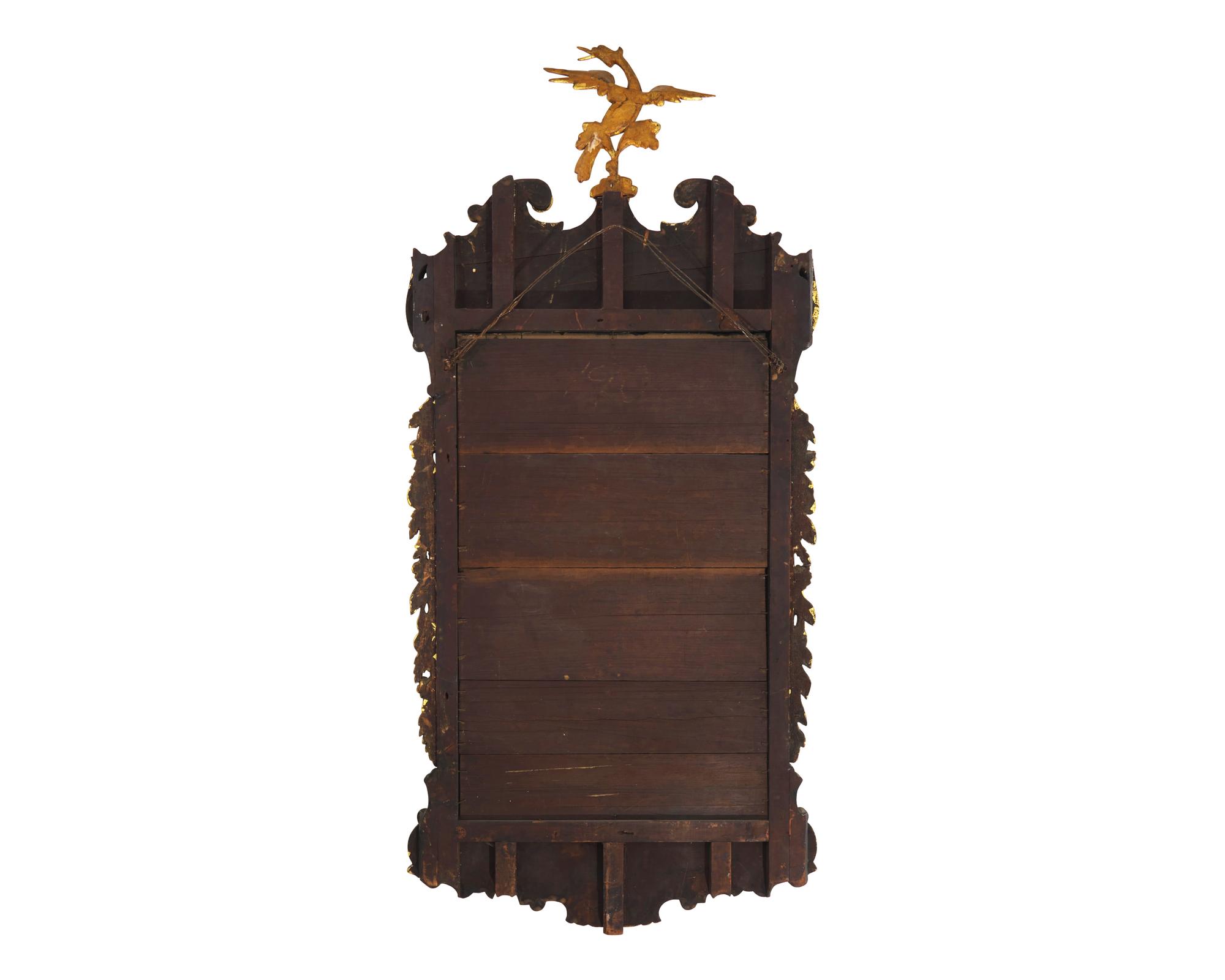 A Fine George II Carved and Engraved Parcel-Gilt Walnut Mirror, Circa 1750
