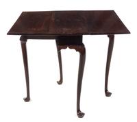 A Queen Anne Walnut Drop-Leaf Table Height 27 1/2 x width 12 (closed) x depth 31 1/4 inches. — 18TH CENTURY