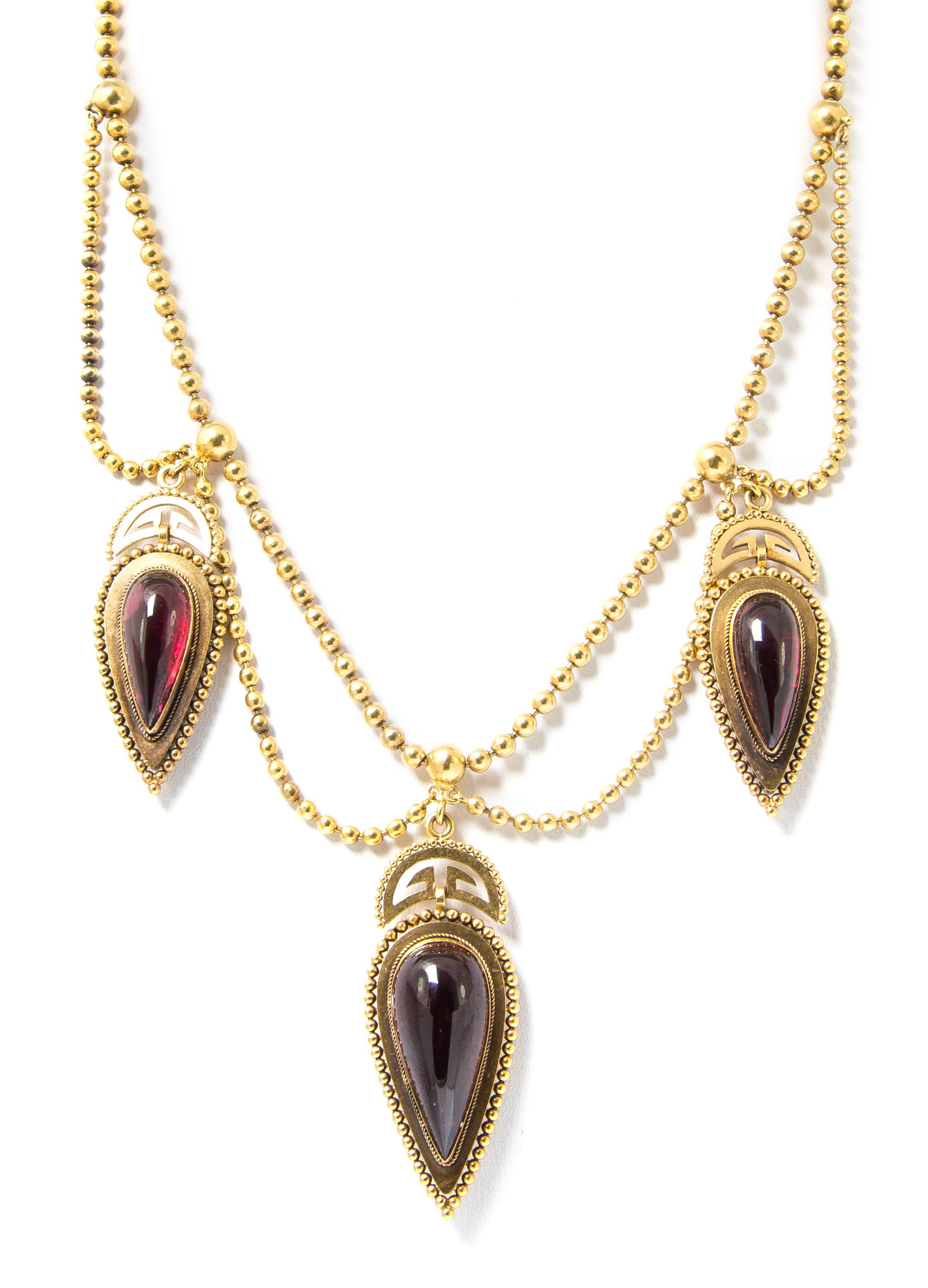 An Antique Yellow Gold and Garnet Swag Necklace, 21.90 dwts.