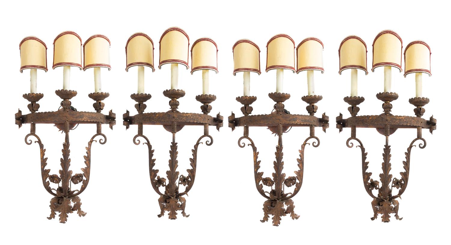 A Set of Four Gilt and Patinated Metal Three-Light Sconces Height 19 inches. — STYLE OF ADDISON MIZNER, EARLY 20TH CENTURY