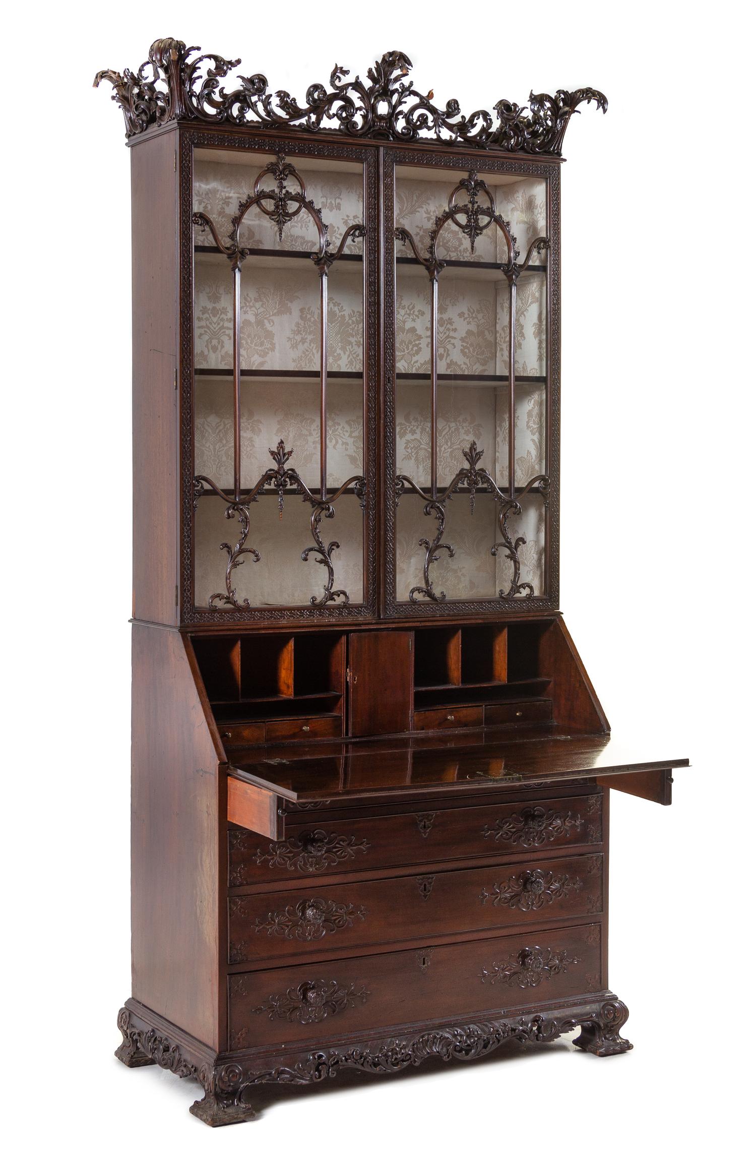 A George III Carved Mahogany Slant-Front Secretary Bookcase
