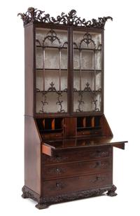 A George III Carved Mahogany Slant-Front Secretary Bookcase