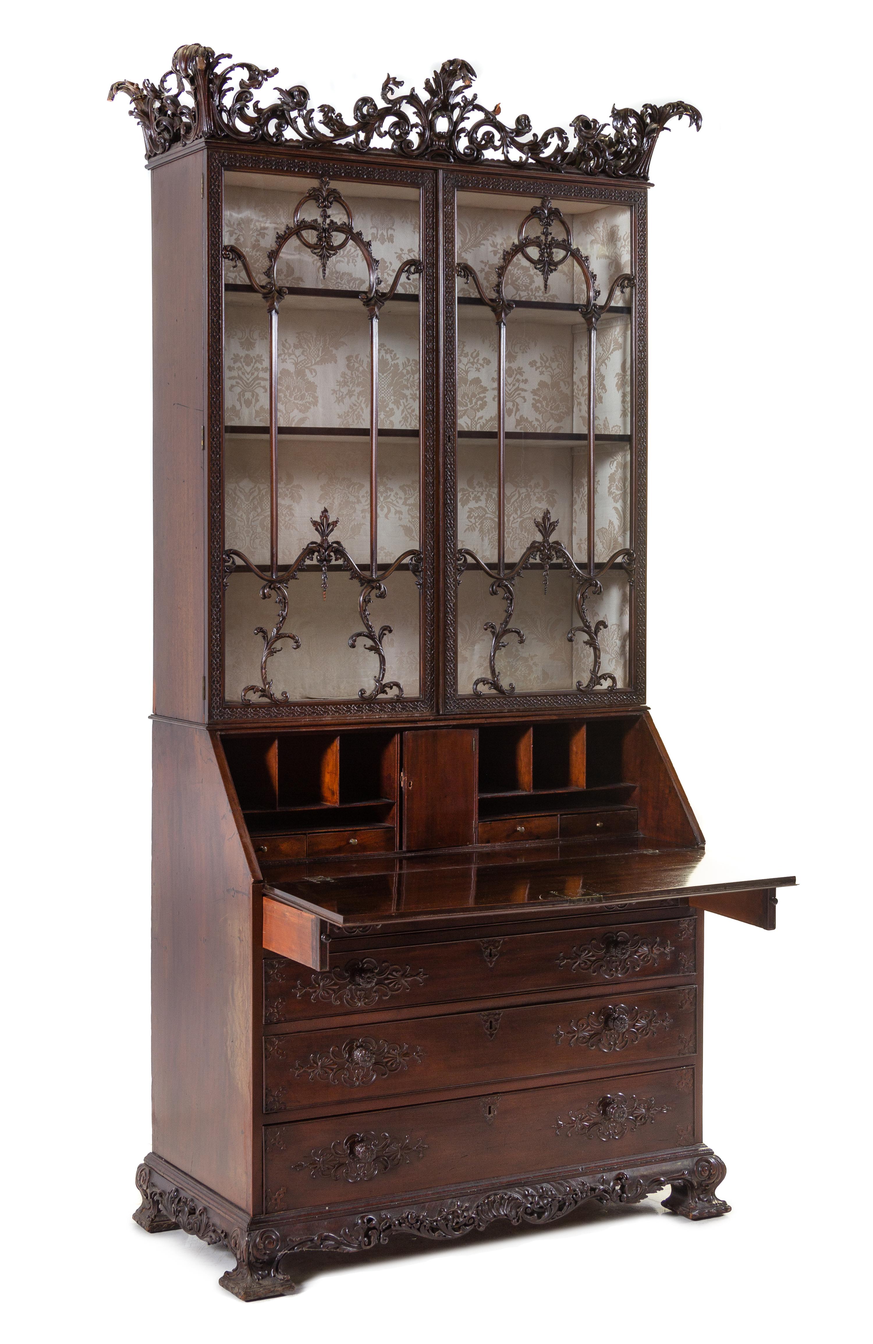 A George III Carved Mahogany Slant-Front Secretary Bookcase
