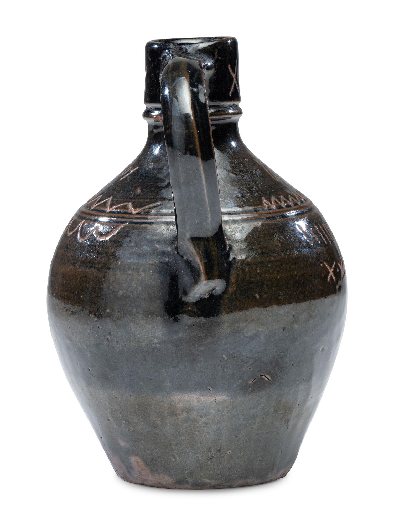 A Potter Ridge Albany Slip-Glazed and Incised Jug