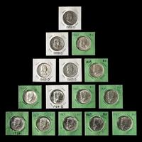 A Group of Eight Pre-1965 50c Coins