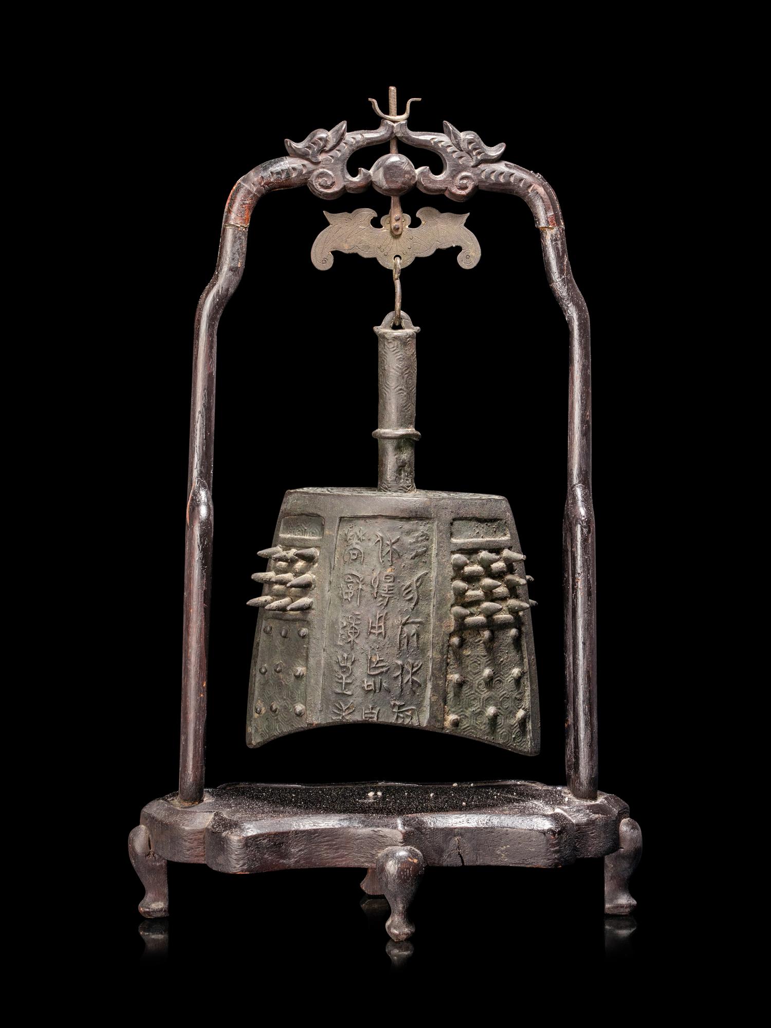 A Chinese Bronze Bell with Stand