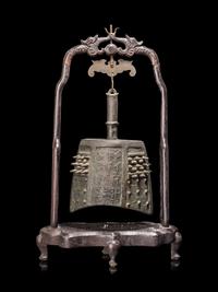 A Chinese Bronze Bell with Stand